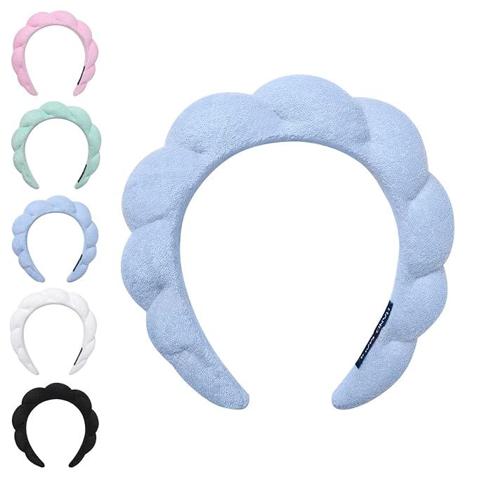 Our Spa headband is the ultimate accessory for your beauty routine. Made from a soft and comfortable combination of sponge and terry fabric, it is perfect for keeping your hair out of your face when washing or applying makeup. The fluffy design, resembling flowers and clouds, adds a cute and playful touch to your look.