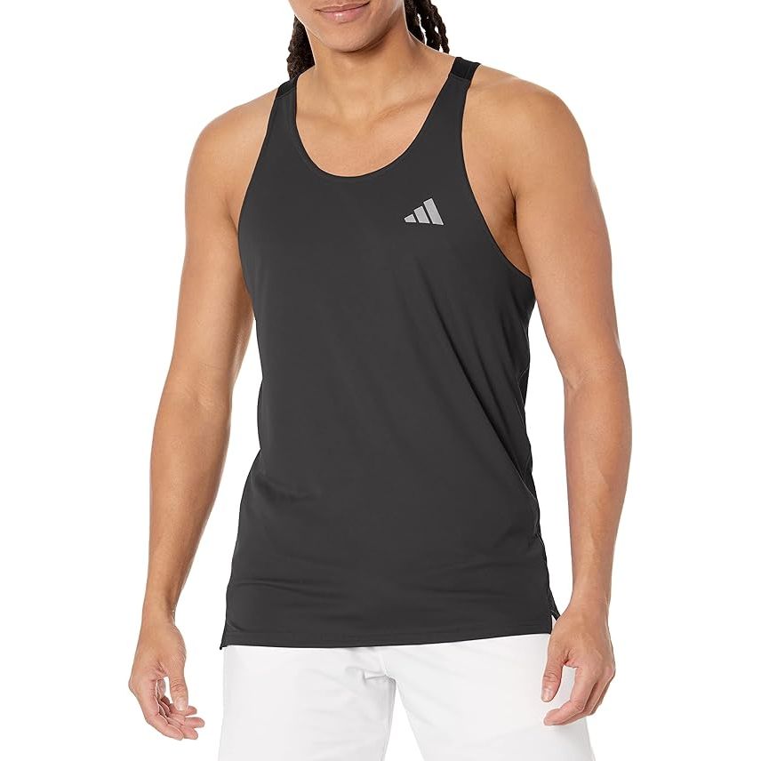 The adidas Men's Running Tank Top is the perfect addition to your workout gear. Made from 100% polyester, this tank top is both durable and comfortable. The pull-on closure makes it easy to put on and take off, while the racerback design allows for complete freedom of motion during your workout.