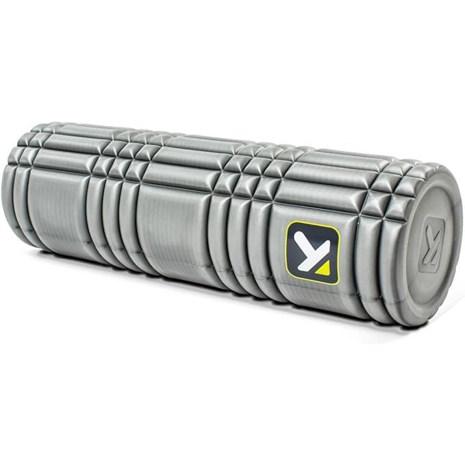 Enhance your self-massage routine and find relief from muscle pain with the Trigger Point Performance 12-inch foam roller. Made from solid-core EVA foam, this durable roller features a unique multi-density GRID pattern for targeted compression, ideal for improving flexibility and reducing pain.