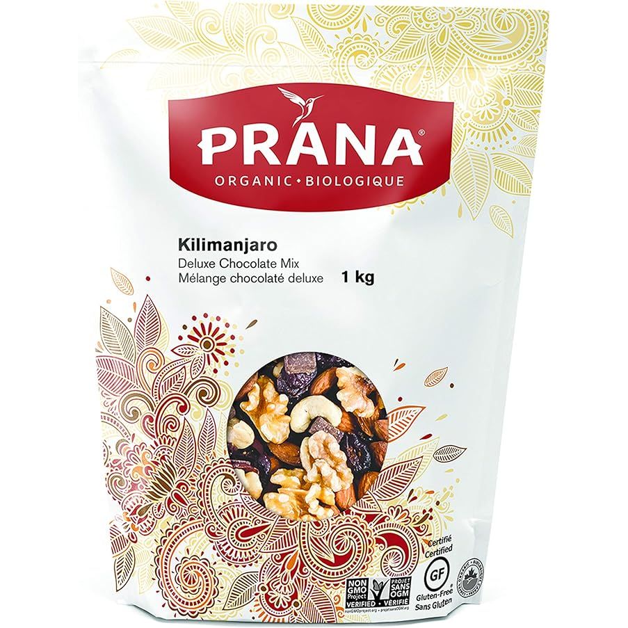 Prana Organic Trail Mix - Kilimanjaro Deluxe Chocolate Mix with Cashews, Raisins, Almonds, Cranberries & Walnuts, is a popular vegan snack option that offers a delightful combination of natural ingredients. Packed with flavor and wholesomeness, this trail mix is both non-GMO and organic.