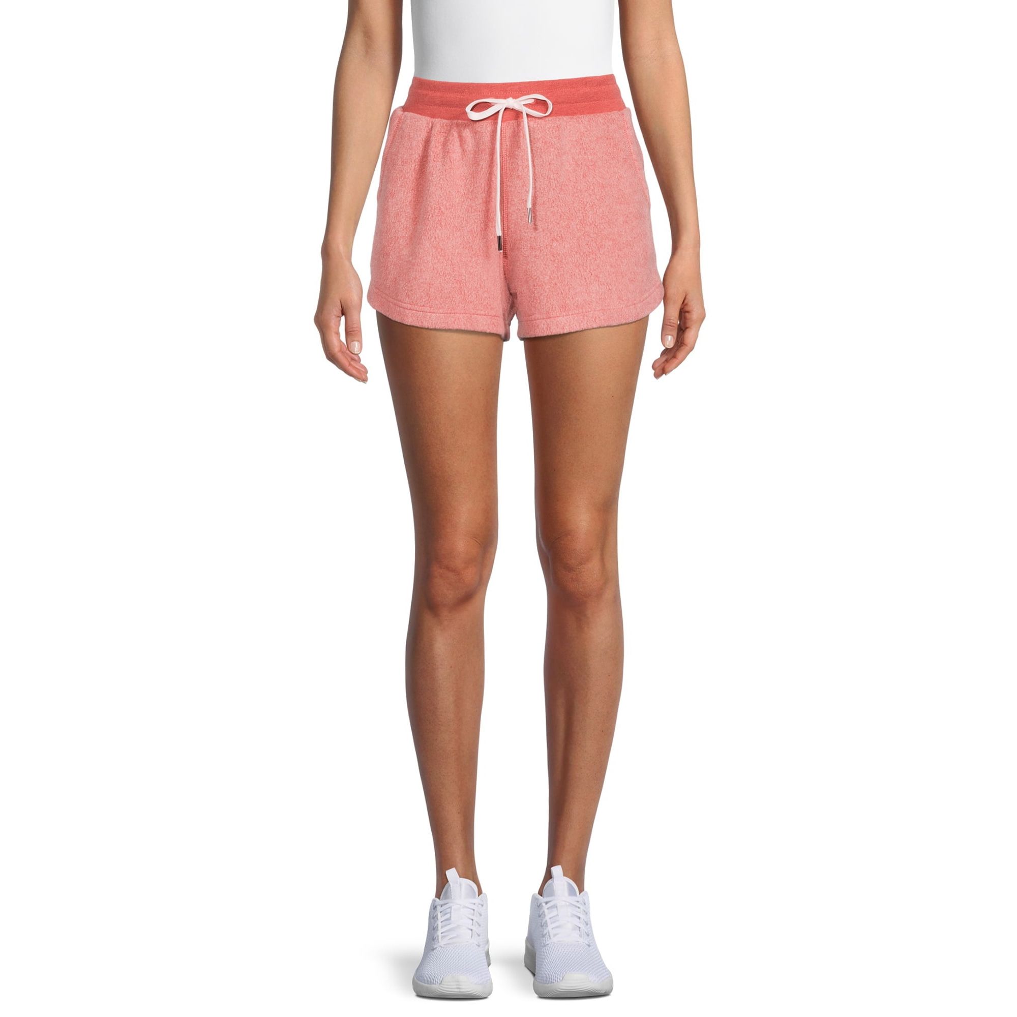 Introducing the Women's Reverse Fleece Lounge Shorts from Avia, a must-have for your casual wardrobe. Crafted with a blend of polyester, cotton, and rayon, these shorts offer a soft and durable feel. The relaxed fit and mid-rise waist make them perfect for lounging or running errands.