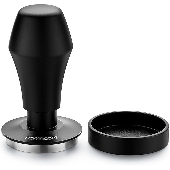 Normcore 49.7mm Coffee Tamper V4 is a versatile barista tool designed specifically for espresso enthusiasts. This spring-loaded tamper is compatible with the ROK Espresso Maker and comes with a flat base and a mat. 
The tamper is crafted using high-quality materials to ensure durability and longevity. Its 49.