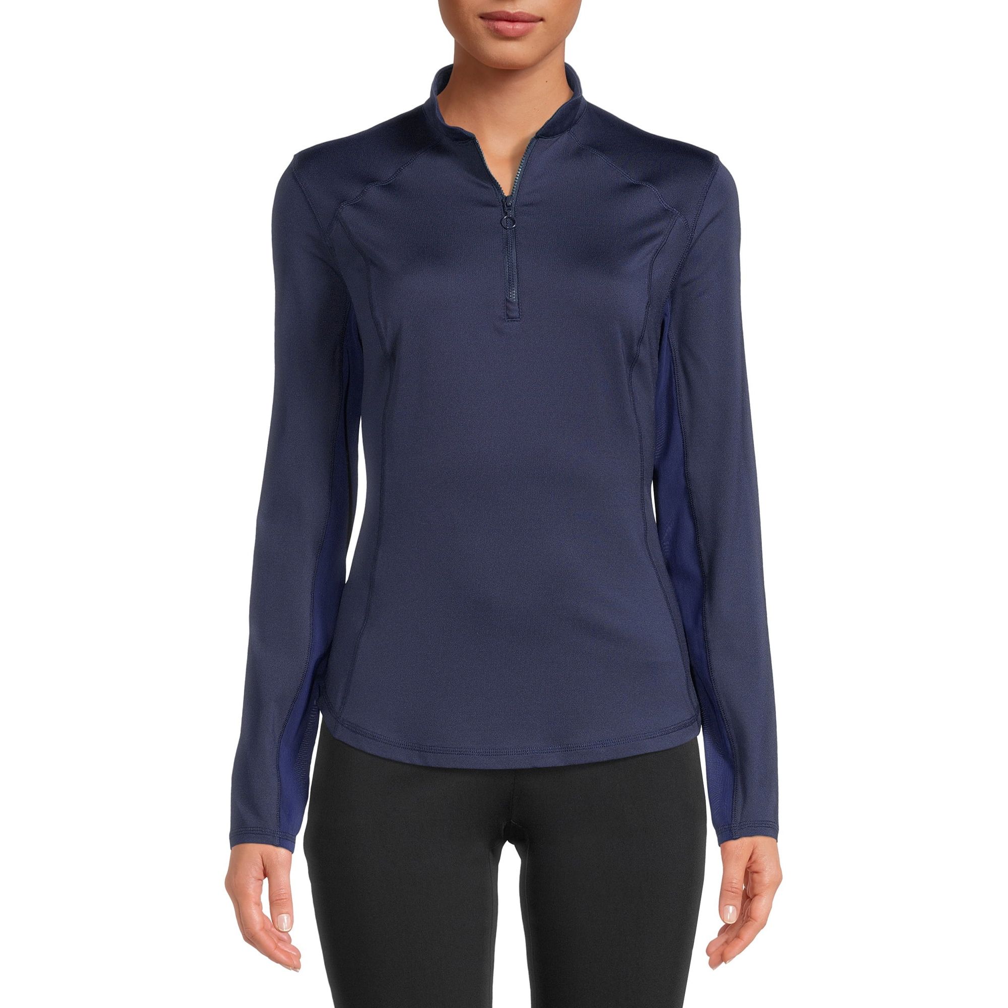 Elevate your golf game with the Women's Long Sleeve Golf Shirt from Ben Hogan. Crafted from a soft and lightweight single knit fabric, this shirt offers a comfortable and flexible fit with plenty of stretch. The mock neck and long sleeves provide added coverage, while the quarter-zip closure allows for easy on and off.