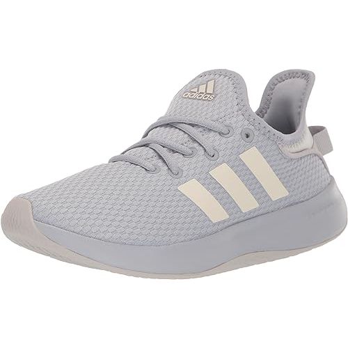 Adidas, a renowned global sports brand, presents the Women's Cloudfoam Pure Sportswear Sneakers designed specifically for active women seeking comfort and style. These sneakers are a popular choice among consumers due to their high-performance features and sleek design.