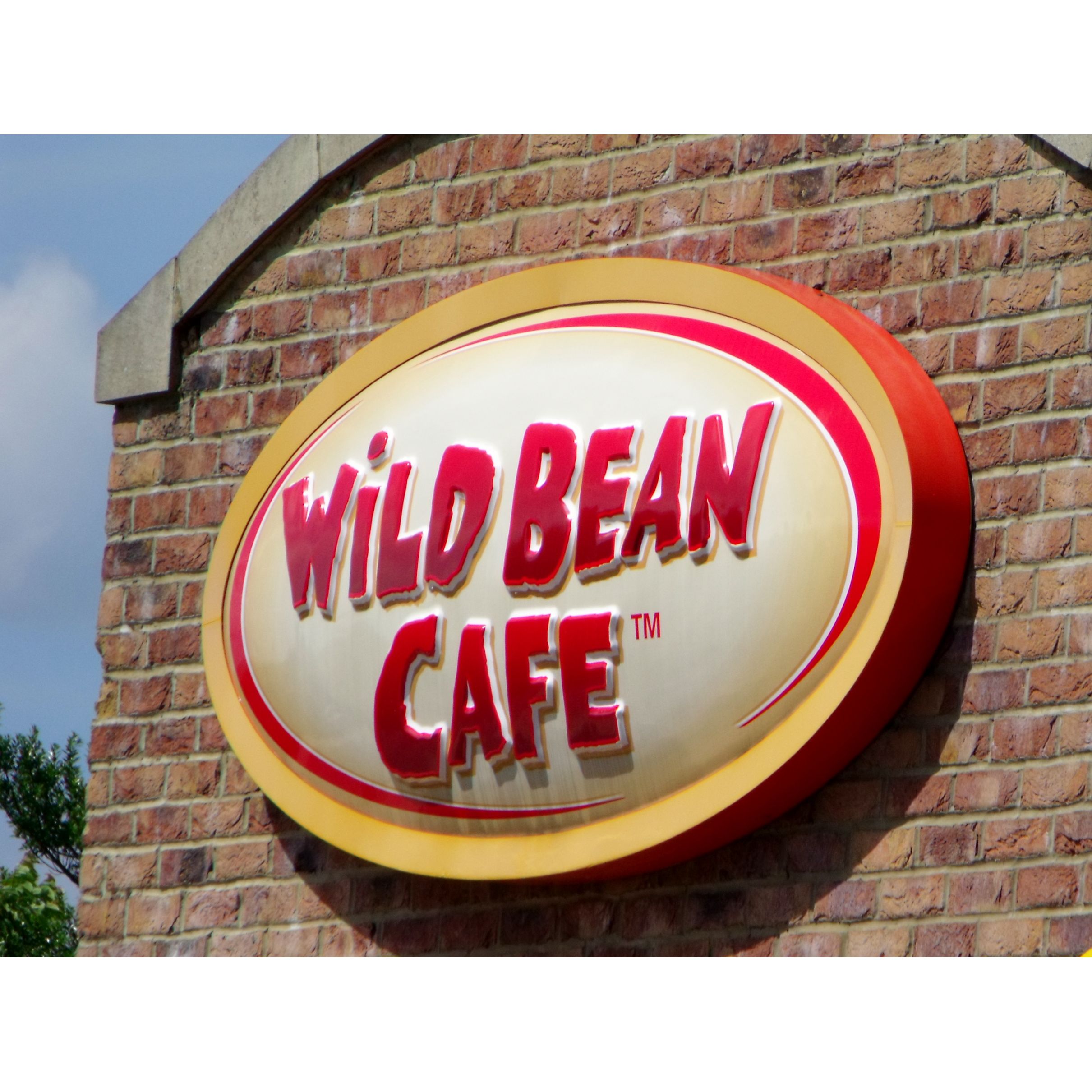 Wild Bean Cafe is a popular coffee chain that was founded in 1996. It is a part of the BP (British Petroleum) company and serves as a convenient option for coffee and snacks at their petrol stations worldwide. The cafe focuses on providing high-quality coffee and a range of food options to customers on the go.

Wild Bean Cafe is known for its commitment to using fair trade and sustainably sourced coffee beans. They offer a variety of coffee drinks, including lattes, cappuccinos, and espressos, made with their signature blend. Additionally, they provide a selection of pastries, sandwiches, and other snacks to cater to different tastes and preferences.

With a focus on quick service, Wild Bean Cafe provides a convenient stop for a quick caffeine fix or a bite to eat for customers traveling or looking for a fast, yet satisfying, coffee experience. The cafe aims to create a welcoming environment and consistently delivers a high standard of products and service to its customers. Description by ChatGPT.