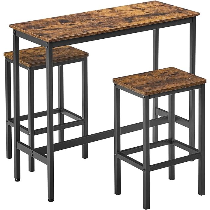 Introducing the perfect addition to any bar lover's home - our bar table and chairs set! With its rustic brown and black tones, this set creates a cozy, pub-like vibe that is sure to delight. Whether you're enjoying a drink with friends or grabbing a quick breakfast before heading out, this set is designed to enhance your leisure or busy times.