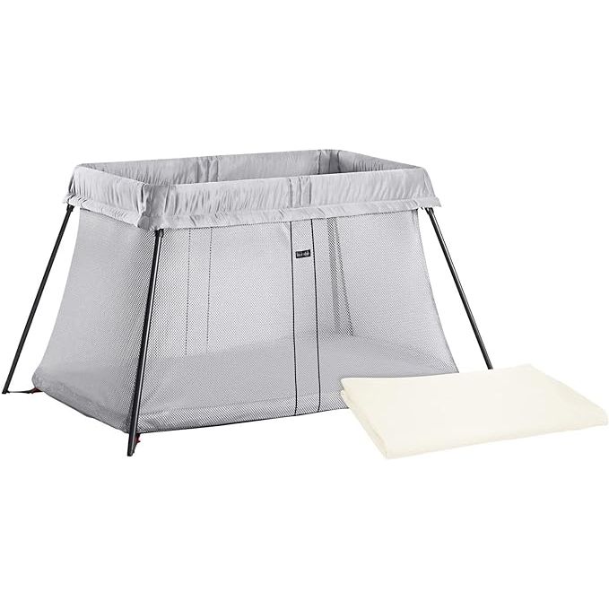 The BABYBJORN Travel Crib Light is a portable and lightweight crib that provides a safe and comfortable sleeping environment for your baby during travel or at home. It weighs only 13 pounds and comes with a convenient carrying case, making it easy to transport and set up wherever you go.