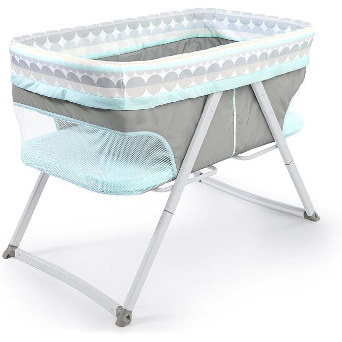 The Ingenuity Foldaway Rocking Bassinet in Juniper is a portable and folding bassinet that offers a convenient solution for parents on the go. Designed with comfort and mobility in mind, this bassinet provides a safe and cozy sleeping environment for your little one.