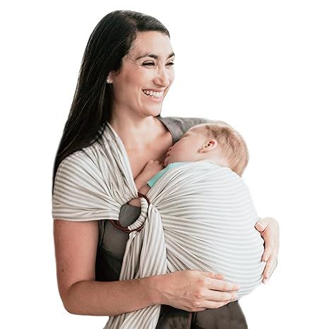 The Nalakai Ring Sling Baby Carrier is a popular and eco-friendly baby carrier that offers comfort, style, and a giving back ethos. Made from soft bamboo and linen fabric, this sling provides a cozy and snug environment for your little one. The blend of bamboo and linen ensures breathability and is gentle on your baby's delicate skin.