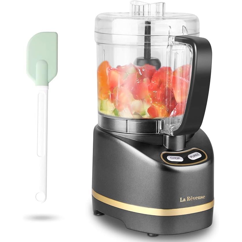 Upgrade your kitchen with the La Reveuse Electric Mini Food Processor, a versatile appliance that can handle all your food preparation needs with ease. Powered by a robust 200-watt motor, this handy tool can mince, chop, grind, blend, and puree ingredients to perfection.