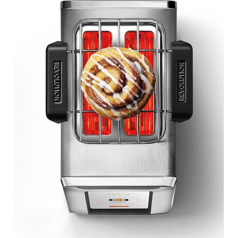 Elevate your toasting experience with the Revolution toaster warming rack, perfect for culinary enthusiasts and aspiring chefs. Easily attachable to your 2-slice toaster, this innovative gadget allows you to delicately warm an array of baked goods from muffins to croissants.