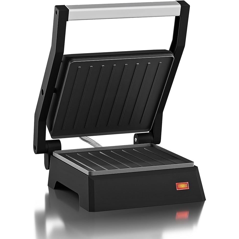 Looking to upgrade your kitchen with a stylish and compact appliance? Look no further than our modern panini press! Measuring at just 5.5 x 5.3 inches, this sleek kitchen gadget packs a punch with its 60 square inch cooking surface when opened flat.