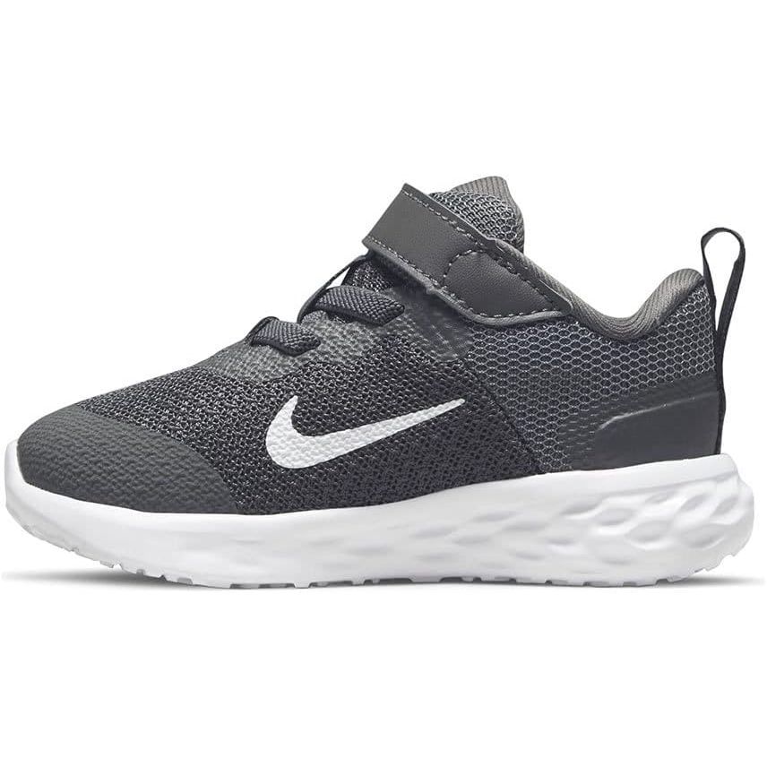 The Nike Revolution 6 Boys Toddler DD1094-003 is a popular athletic shoe designed specifically for toddlers. This shoe features a lightweight and breathable mesh upper, providing comfort and support for little feet on the go. The shoe also has a hook-and-loop closure for easy on and off, making it convenient for parents and caregivers.