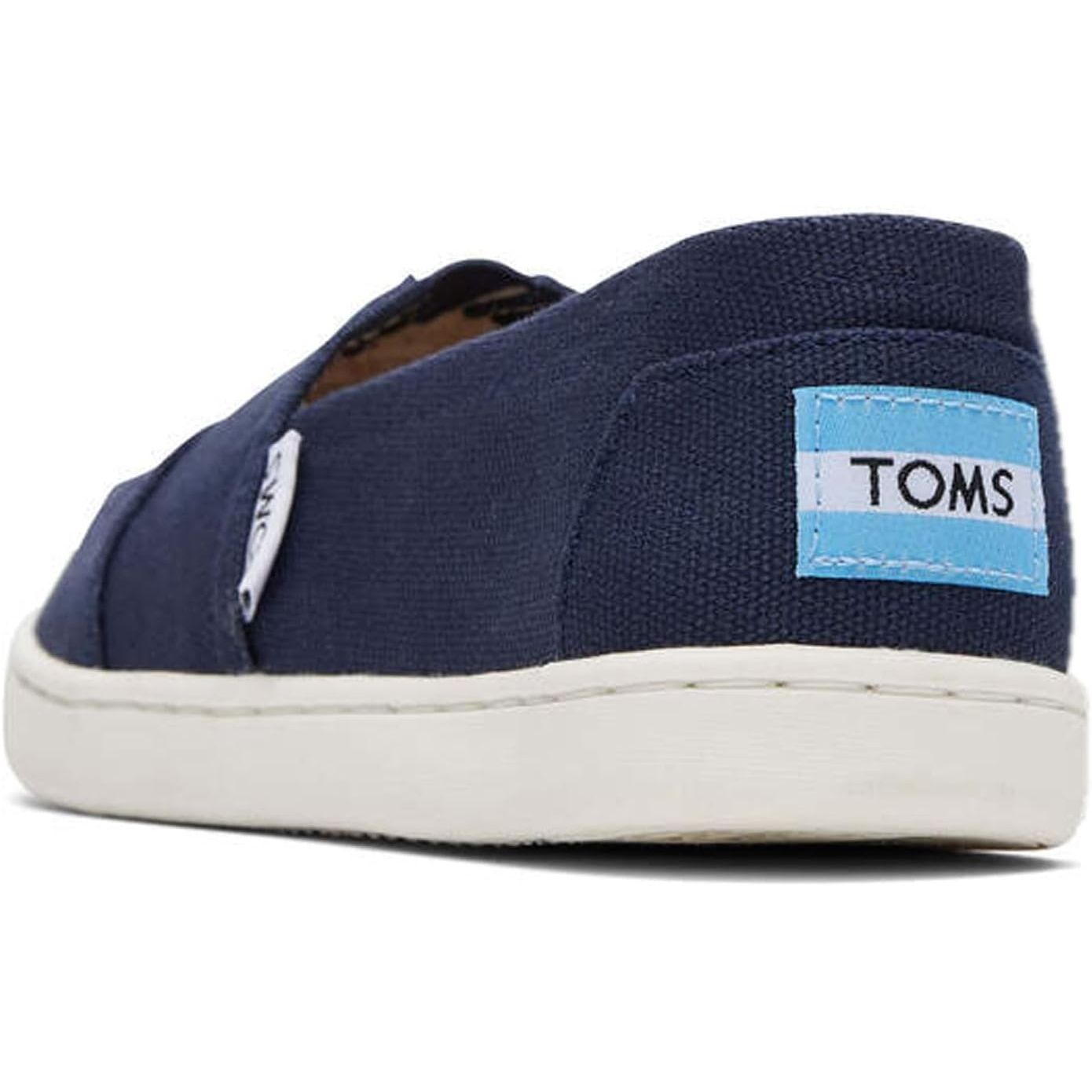 The TOMS Girl's Alpargata Tiny Slip-On is a popular shoe designed for toddlers. These slip-on shoes are made with a canvas upper and a rubber sole, providing comfortable and durable wear for active young children. The Alpargata design features a classic silhouette with a round toe and elastic V-panel for easy on and off.
