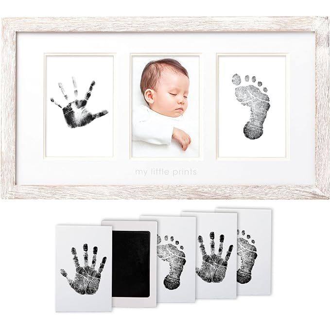 The Pearhead Newborn Handprint and Footprint Nursery Picture Frame is a gender-neutral baby keepsake designed to help parents capture and preserve the cherished memories of their little one's early days. The frame includes a no-mess clean-touch ink pad for easily creating hand and footprint impressions without getting ink on the baby's skin.