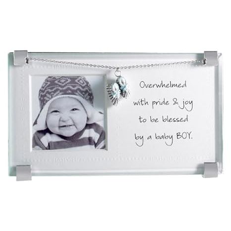 Capture the precious moment of your newborn baby boy with the Mud Pie New Baby Clip Frame. This charming frame is adorned with a bootie charm that dangles elegantly from the silver trimmed frame, adding a touch of whimsy to your nursery decor.