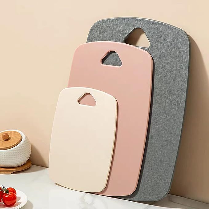 Enhance your kitchen with this versatile Plastic Cutting Board Set, featuring three durable and thick boards in a vibrant pink color. Perfect for cutting meat, vegetables, fruits, and more, these boards are designed for safety and efficiency in food preparation.