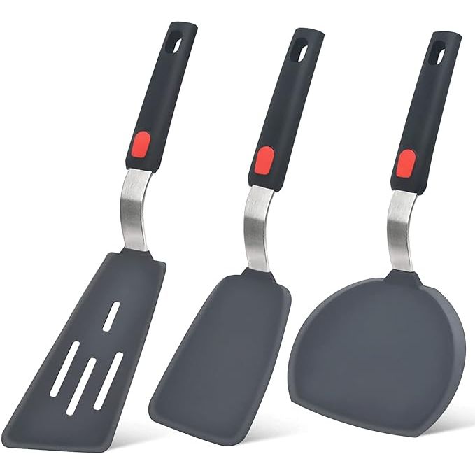 Upgrade your kitchen game with the Silicone Spatula Turner Set of 3 by Beijiyi. Crafted from high quality silicone, these spatulas can withstand up to 600°F, making them perfect for use with nonstick cookware. The set includes three different sized spatulas for all your cooking tasks, from flipping eggs to burgers.