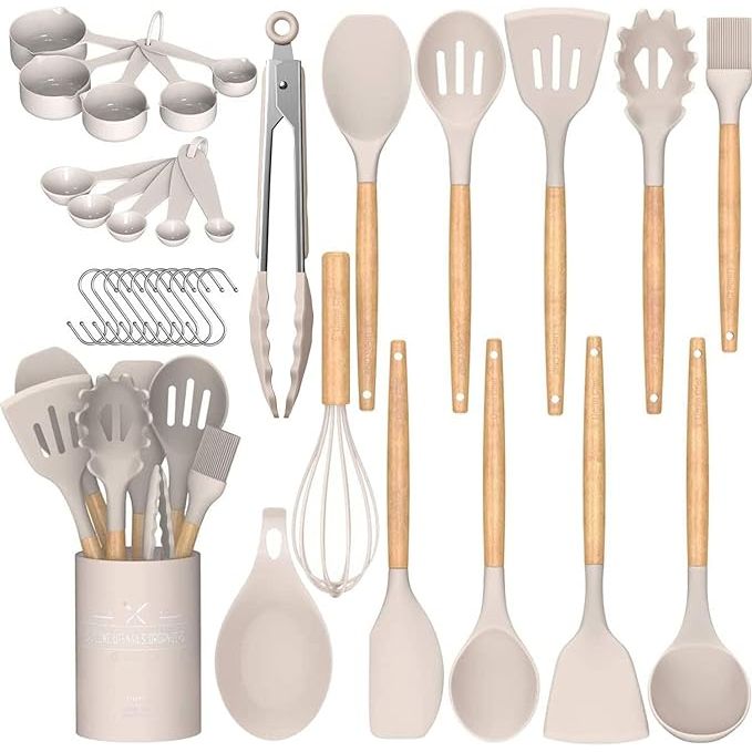 Enhance your cooking experience with the Umite Chef Kitchen Cooking Utensils Set, a 33-piece collection of non-stick silicone kitchen tools. Each utensil features a comfortable wooden handle and a sophisticated khaki color that will elevate the look of your kitchen.