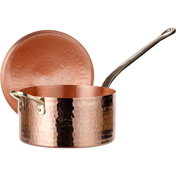 Handcrafted in Turkey, the DEMMEX 1mm Thick Hammered Copper Pot is a reliable and versatile cooking companion. Made from solid unlined and uncoated copper, this pot ensures exceptional heat conduction and retention for all your culinary creations. With a generous 1.