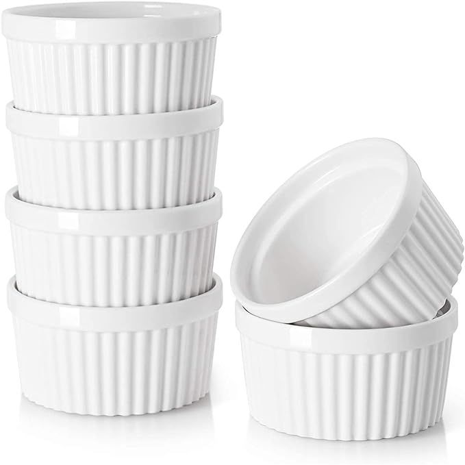 The DOWAN 4 oz Ramekins for Creme Brulee are a timeless choice for baking and serving individual desserts like souffles and creme brulee. This set of 6 porcelain ramekins in classic white is not only oven-safe but also microwave, dishwasher, and freezer safe for easy cleaning and storage.