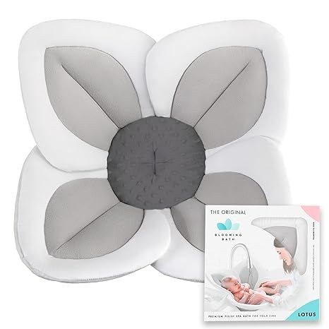 The Blooming Bath Baby Bath Seat is a unique and innovative way to safely and comfortably bathe your newborn infant to toddler aged 0 to 6 months. This baby tub is designed in the shape of a flower and made from soft, plush materials that cradle and cushion your baby during bath time.