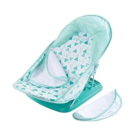 The Summer Infant Deluxe Baby Bather with Warming Wings in Green Triangle is a versatile and convenient bath support designed for newborns to toddlers. It features a soft mesh sling that cradles your baby securely during bath time, making it easier for parents to bathe their little ones.