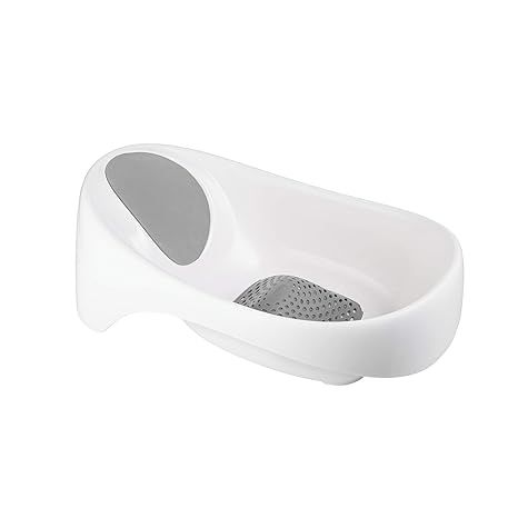 The Boon Soak 3 Stage Baby Bathtub is a versatile and innovative baby bath tub that is designed to grow with your child from newborn to toddler age. It features three support positions to easily adjust as your baby grows and develops. The adjustable positions help to provide a comfortable and secure bathing experience for your little one.