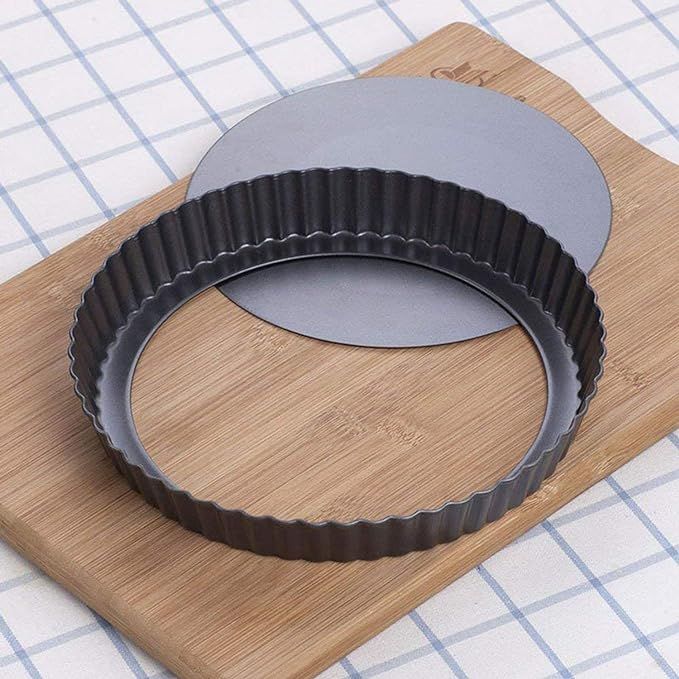 Introducing the RICHSC-PAN Tart Pan, a high-quality 9-inch carbon steel pan with a non-stick coating. This tart pan features a convenient removable loose bottom, making it effortless to release your baked creations without any damage. With a top diameter of 9.5 inches and a bottom diameter of 9 inches, this pan is 1.