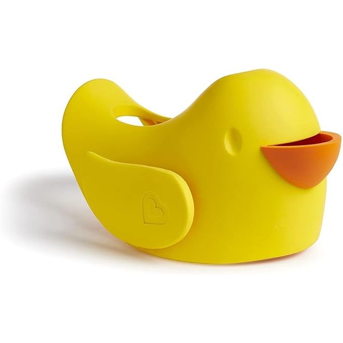The Munchkin® Beak™ Bath Spout Cover is a cute and convenient safety guard designed to cover a bathtub spout and protect your child from bumps and bruises during bath time. The cover is shaped like a yellow bird's beak, making it a fun and decorative addition to your bathroom décor.