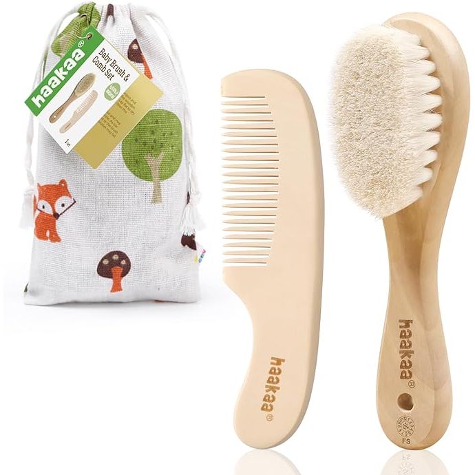 The Haakaa Baby Hair Brush and Comb Set is designed to gently groom your baby's hair, making it ideal for newborns and toddlers. The set comes with a soft goat bristle brush and a wooden comb, both of which are gentle on delicate baby skin and hair. The natural goat bristles help to prevent cradle cap and promote healthy hair growth.