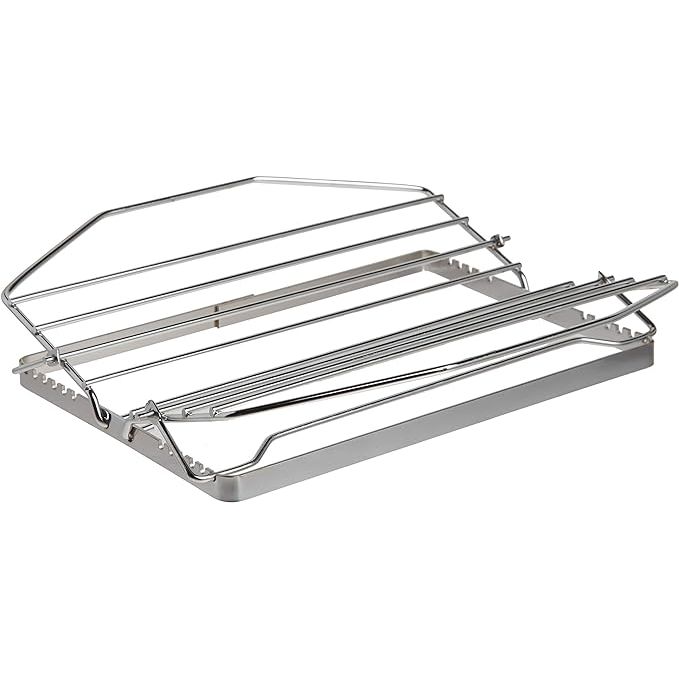 The Norpro 275 Adjustable Roast Rack is the perfect kitchen accessory for anyone looking to achieve delicious, evenly cooked roasts, poultry, and other meats. Made of durable nickel-plated steel, this versatile rack is not only easy to clean but also adjustable in size, ranging from 9 to 11 inches in length to accommodate various dishes.