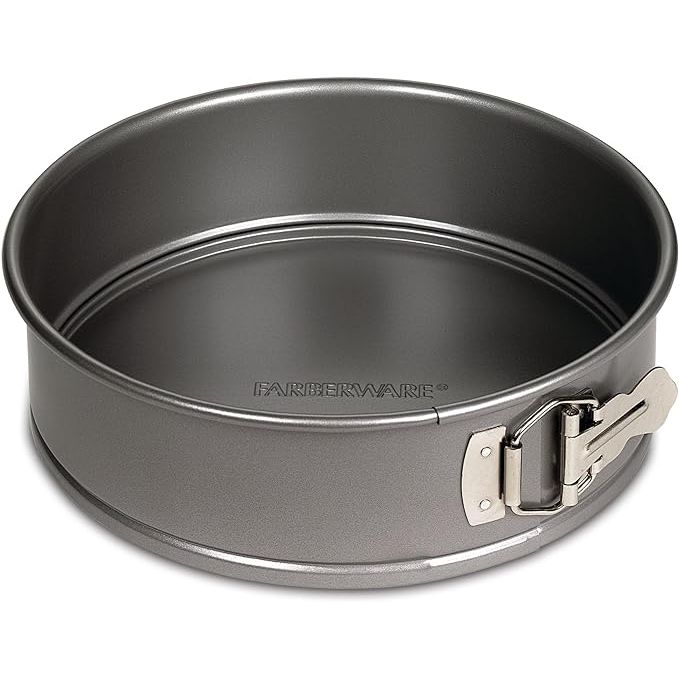 Create stunning round cheesecakes with the Farberware Bakeware Springform Baking Pan. Made from heavy-duty carbon steel, this 9-inch pan ensures even heating and browning for perfectly baked cakes every time. The nonstick coating allows for easy release of your creations, making cleanup a breeze.