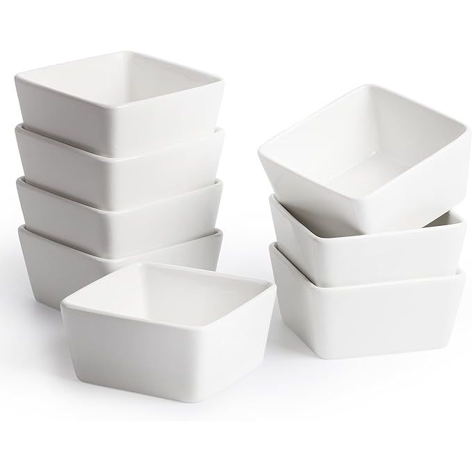 Enhance your culinary experience with the BTaT Square Porcelain Ramekins. This set of 8 versatile ramekins is designed for baking and serving a variety of dishes, from souffles to custards and more. Crafted from durable porcelain, these ramekins can handle high temperatures and are safe for use in the oven, microwave, and dishwasher.