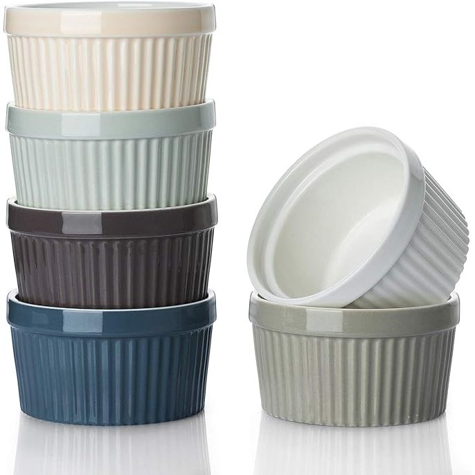 Enhance your baking and dining experience with DOWAN Ramekins 8 oz. These oven-safe porcelain bowls are perfect for baking and serving creme brulee, souffle, and other delicious desserts. With a classic and stylish design in a multi-brown color, this set of 6 ramekins is ideal for both casual and formal dining settings.