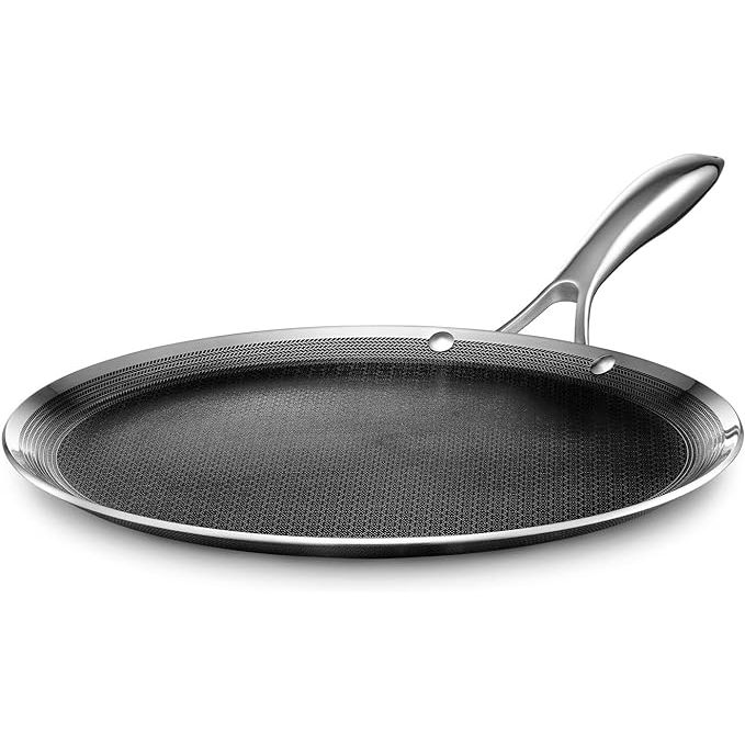 Experience the ultimate in cooking convenience with the HexClad Hybrid Nonstick Griddle Pan. This 12-inch cookware features a unique combination of stainless steel and nonstick layers for durability and easy cleaning.