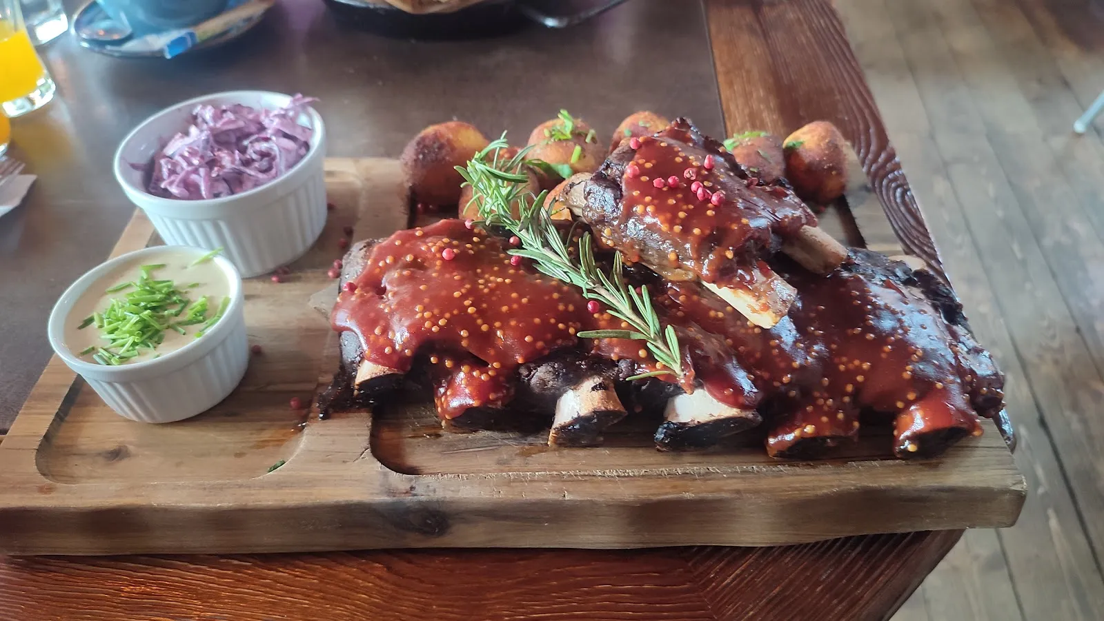 This steakhouse has earned a reputation for delivering good value for money with a menu that meets and exceeds expectations for a traditional steakhouse. Patrons praise the meats for being consistently cooked to order and commend the portion sizes and swift service that accompanies their dining experience. The cozy atmosphere is further enhanced on the first floor, which offers additional seating for larger groups or when the ground floor reaches capacity.