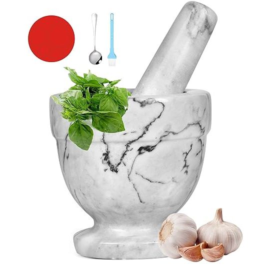 Enhance your culinary experience with the Mortar and Pestle Marble Set, a versatile kitchen tool perfect for grinding spices, creating pestos, and making guacamole. Crafted from durable and elegant marble, this set not only adds a touch of sophistication to your kitchen decor but also offers functionality with its 4.