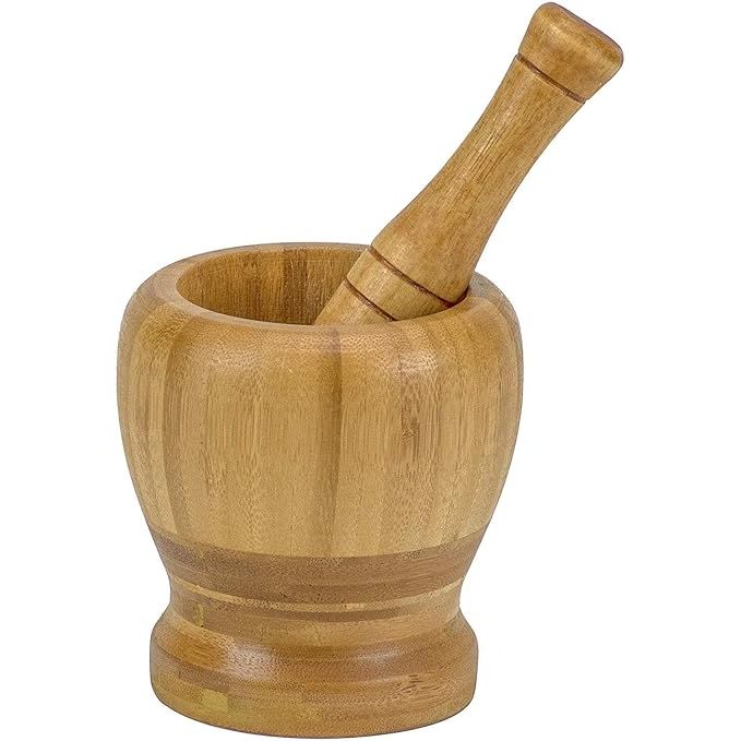 Experience the natural elegance of the DecorRack Mortar and Pestle, a 100% bamboo spice grinder perfect for crushing and grinding various ingredients in the kitchen. This stylish set includes a 4-inch wooden mortar and pestle, designed to bring out the full flavors and aromas of your favorite herbs and spices with ease.