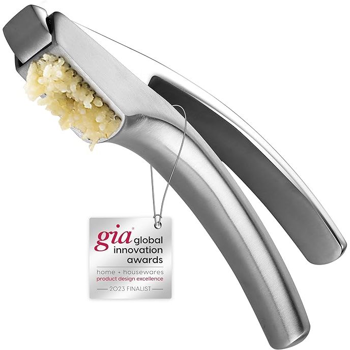 Experience the convenience and efficiency of the Garlic Press Stainless Steel, a durable kitchen tool that effortlessly minces garlic without the need for peeling cloves beforehand. Crafted from sturdy stainless steel, this garlic mincer boasts an ergonomic design for easy handling and optimal results with minimal effort.