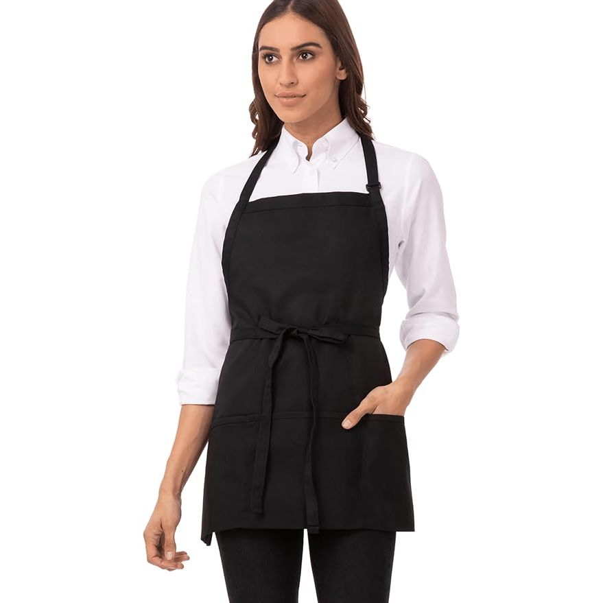 The Chef Works Unisex Three Pocket Apron is the ultimate accessory for chefs, servers, and kitchen staff looking for both style and functionality. This versatile apron is designed to fit both men and women comfortably with its unisex design.