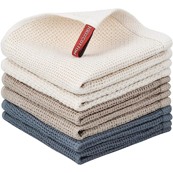 Upgrade your kitchen with the Nialnant 6 Pack Kitchen Towels and Dishcloths Sets, crafted from 100% cotton for a soft, absorbent, and quick-drying experience. Measuring 12x12 inches each, these towels are perfect for various kitchen tasks such as drying dishes, wiping countertops, or cleaning spills with ease.