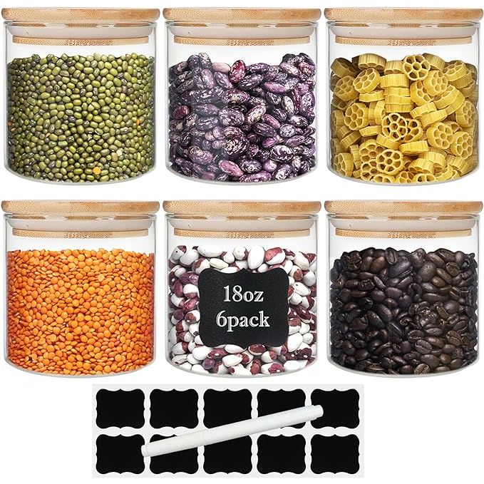 Upgrade your kitchen organization with our set of six 18oz Glass Jars with Bamboo Lids. Constructed from durable borosilicate glass, these airtight canisters are perfect for storing pantry essentials like spices, flour, and sugar. The heat-resistant material ensures safe food storage in a stylish and practical way.