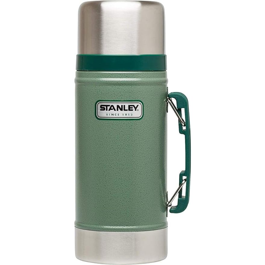 Keep your food hot or cold for extended periods with the Stanley Classic Vacuum Food Jar 24oz Hammertone Green. Ideal for soups, stews, or other meals on-the-go, this thermos boasts a 24oz capacity and a stylish hammertone green color.