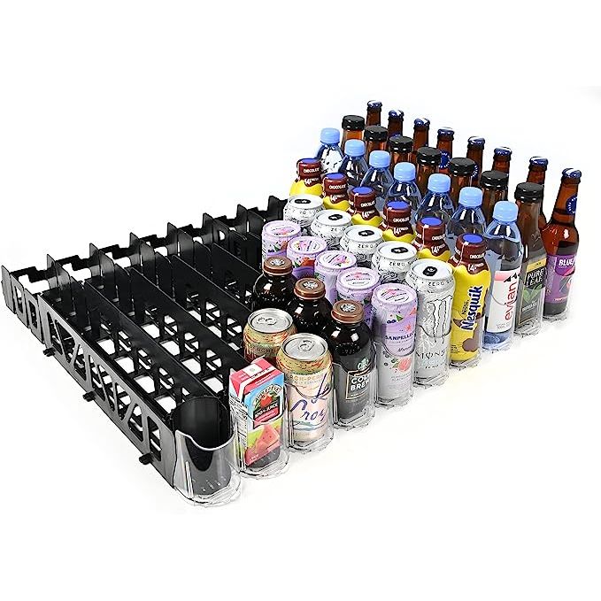 Upgrade your fridge organization with the Display Technologies Visi-FAST Spring Fed Organizer! This innovative storage solution is perfect for keeping 12/16oz bottles and cans in order, whether in a commercial establishment or at home.