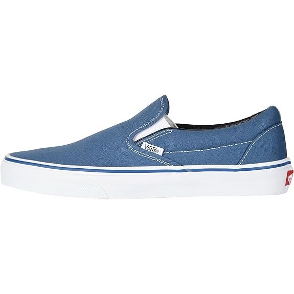 Experience the timeless appeal of the Vans Adult Unisex Classic Slip-On Shoes, a renowned footwear style that has been a favorite since the 1970s. Boasting a simple yet versatile design featuring a slip-on silhouette and elastic side accents, these shoes offer both style and convenience.