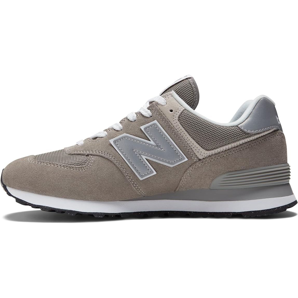 The New Balance Men's 574 Core Sneaker is a timeless and versatile shoe that has remained a popular choice in the brand's collection for years. Featuring a sleek design and a comfortable fit, this sneaker is perfect for everyday wear and casual outings.