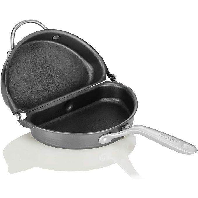 Elevate your culinary creations with TECHEF's premium Frittata and Omelette Pan – a masterpiece of design and functionality. Crafted in Korea, this double-sided culinary marvel boasts a state-of-the-art folding mechanism, streamlining your breakfast preparation and transforming the most novice home cook into an omelette aficionado.