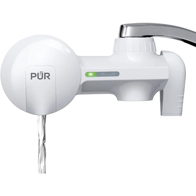 Elevate your home's water quality effortlessly with the PUR Faucet Mount Water Filtration System, the perfect blend of functionality and convenience for your kitchen. Engineered to effectively purify tap water, this intuitive system boasts advanced filtration technology that significantly diminishes levels of lead and various unwanted contaminants.