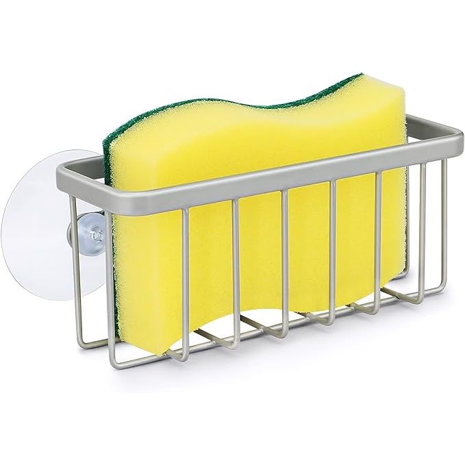 Keep your sponge within arm's reach and your kitchen impeccably tidy with our ingeniously crafted kitchen sink sponge holder. Expertly designed for maximum convenience and efficiency, it boasts a robust attachment system that affixes effortlessly to your sink's edge or countertop.